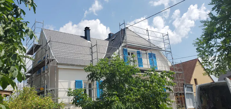 Toiture en tuiles Arboise ardoisées et façade isolée à Logelbach